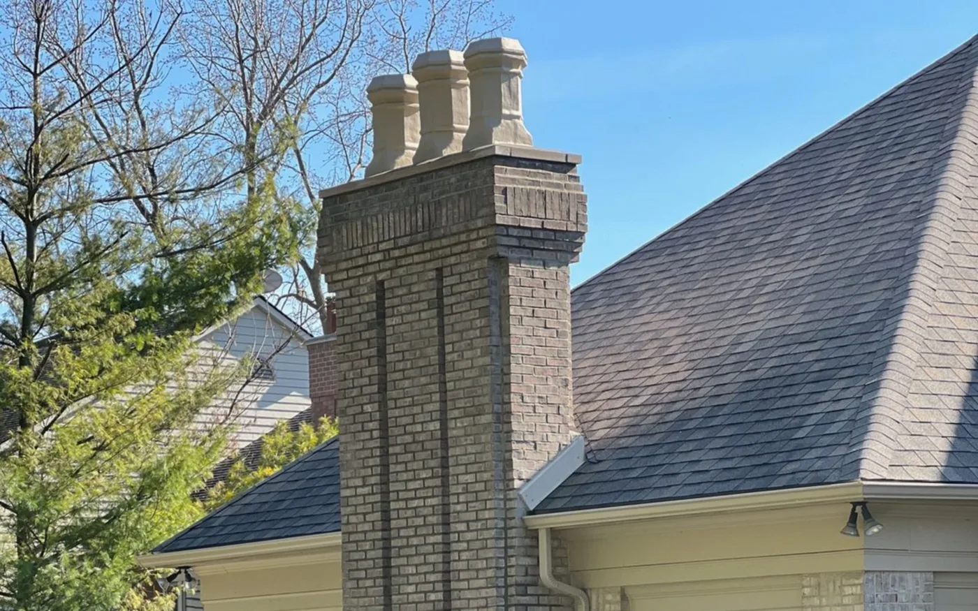 Brick chimney rebuilt by Crown Contracting