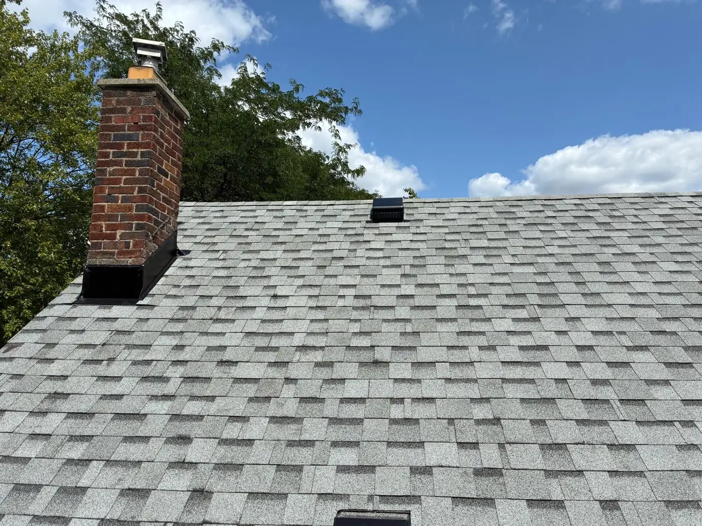 New roof and flashing around the chimney